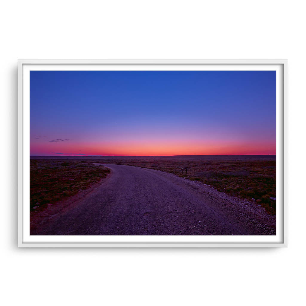 Sunrise over the Cape Range in Western Australia framed in white