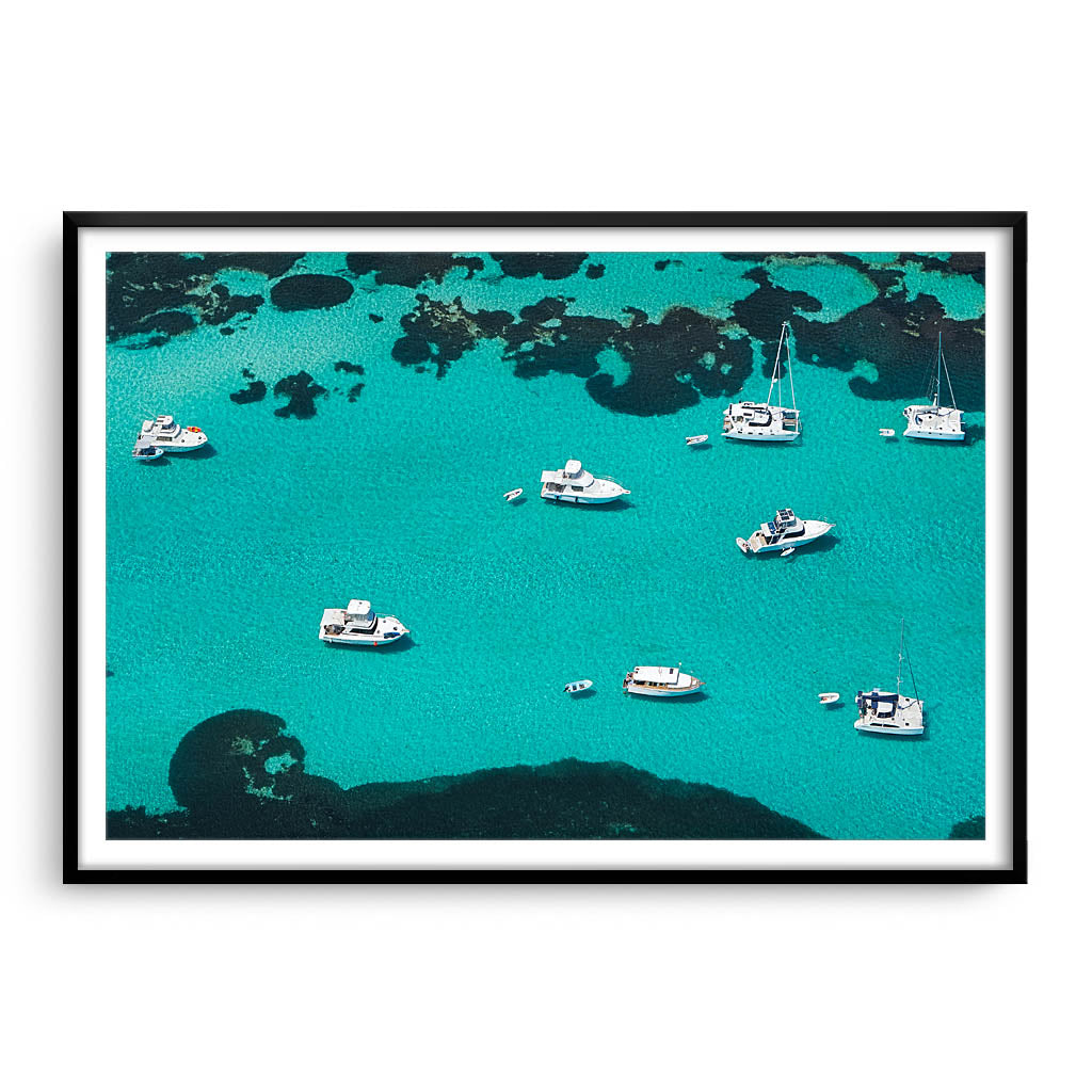 Aerial view of boats at Rottnest Island in Western Australia framed in black