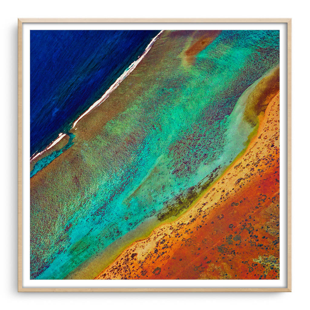 Aerial view of the Ningaloo Reef in Western Australia framed in raw oak