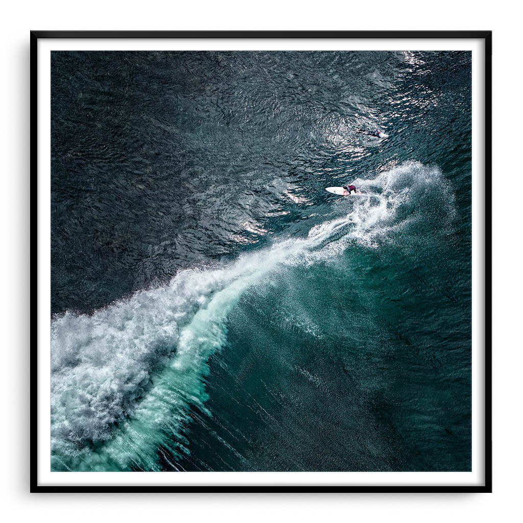 Aerial view of surfer at Margaret River Main Break in Western Australia framed in black