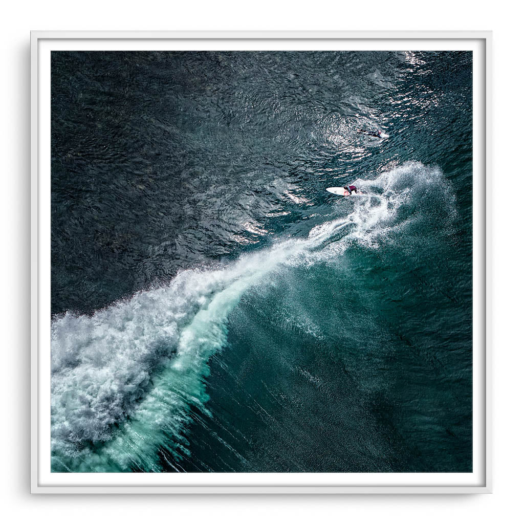 Aerial view of surfer at Margaret River Main Break in Western Australia framed in white