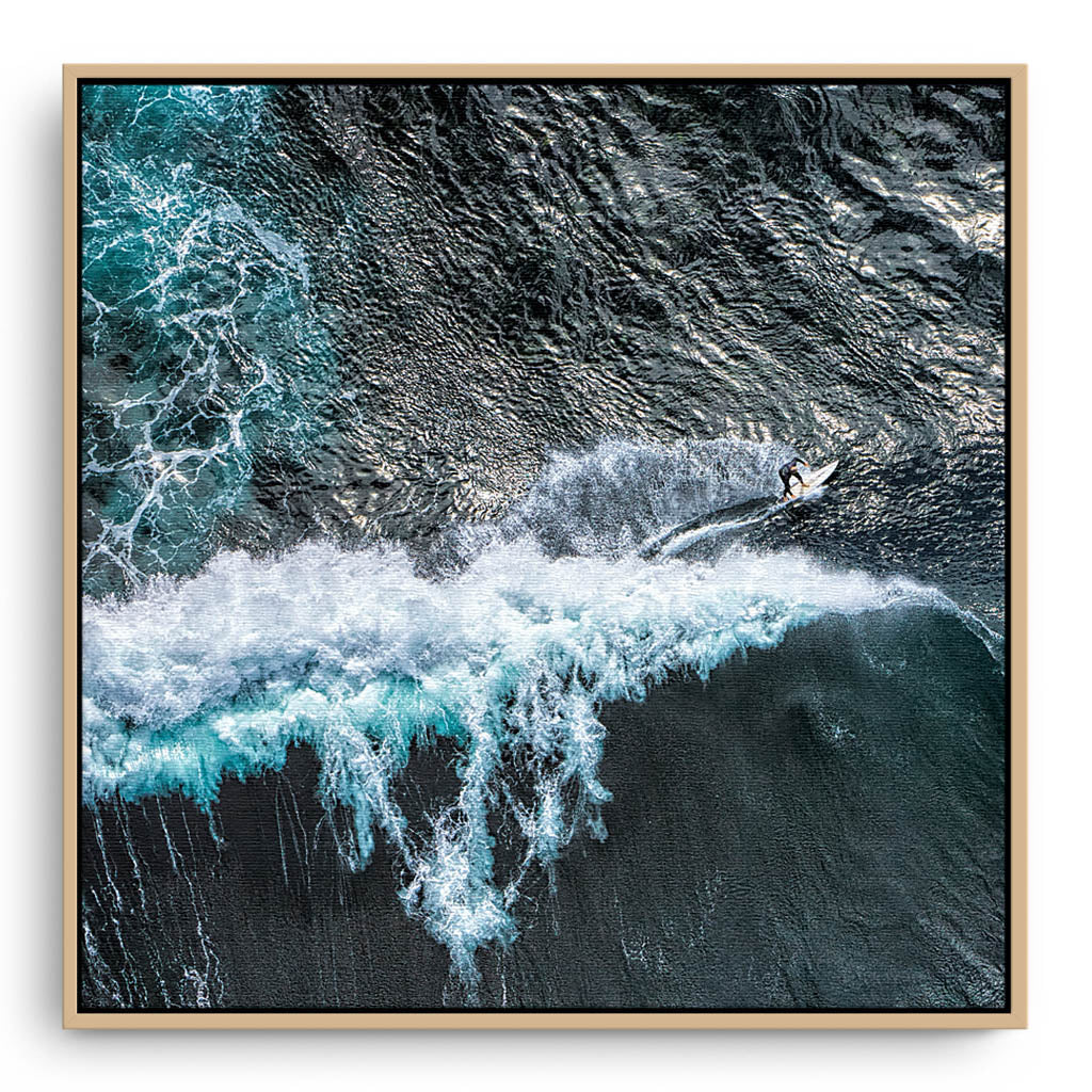 Aerial view of surfer at Margaret River Main Break in Western Australia framed canvas in raw oak