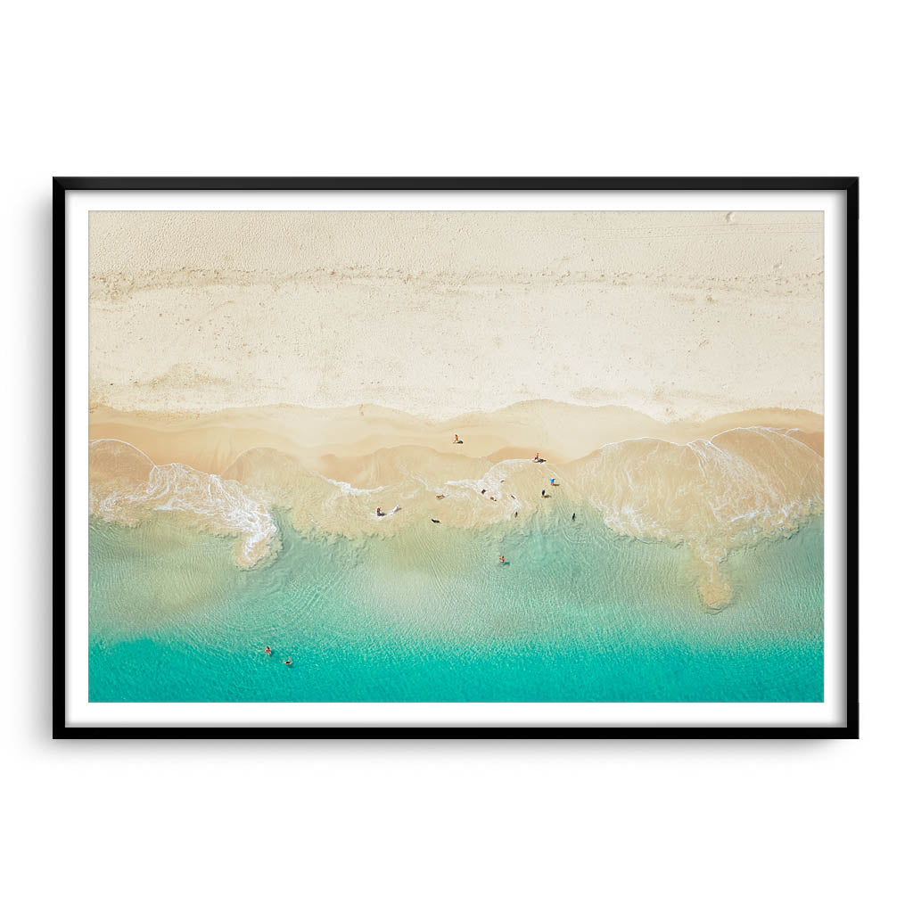 Aerial view of dogs playing in the ocean, Perth, Western Australia framed in black