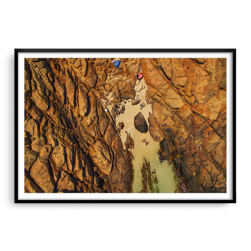 aerial view by drone of wyadup rock pools in western australia framed in black