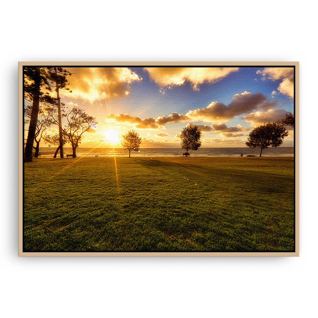 Golden sunset at City Beach in Western Australia framed canvas in raw oak