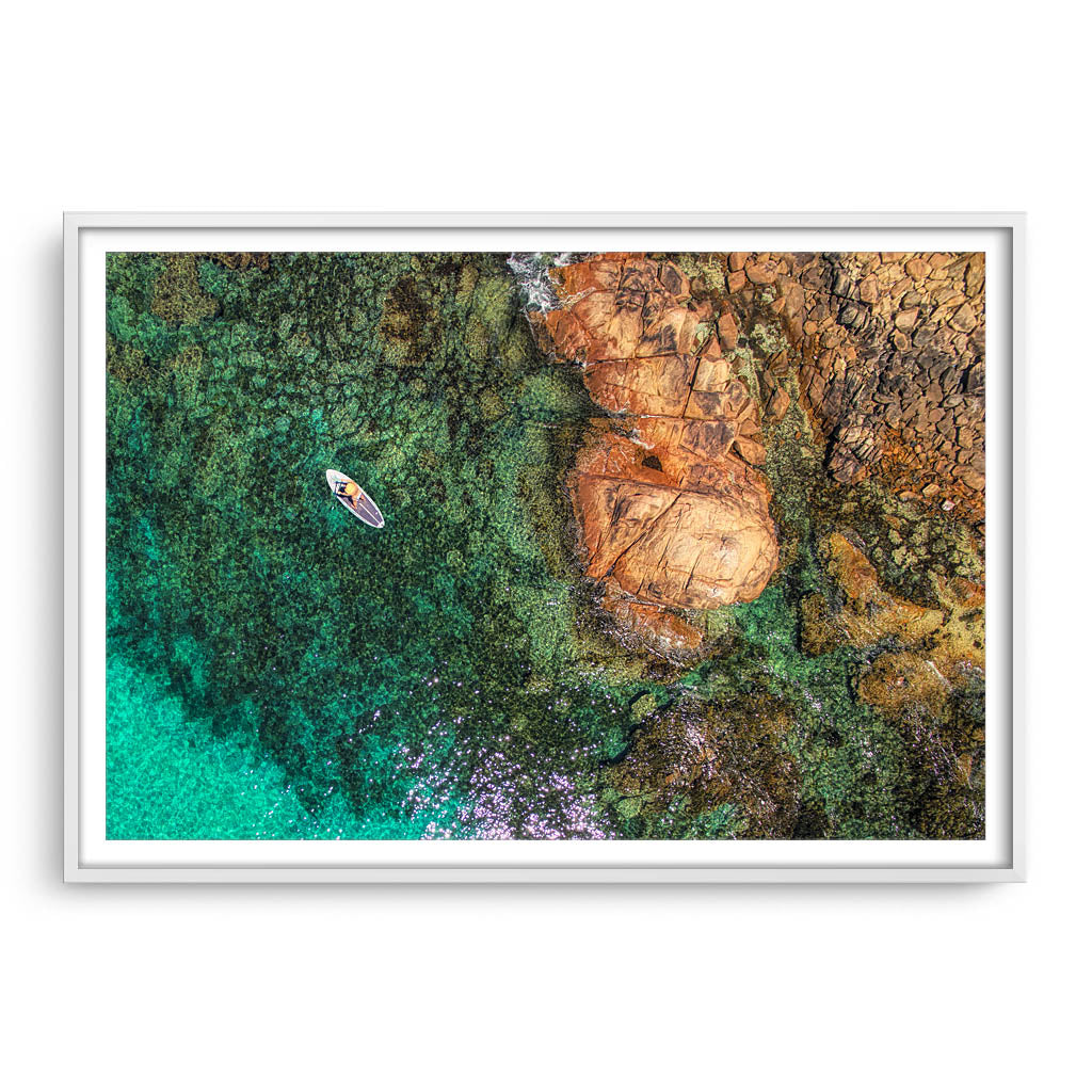 Aerial view of SUP at Meelup Beach in Western Australia framed in white
