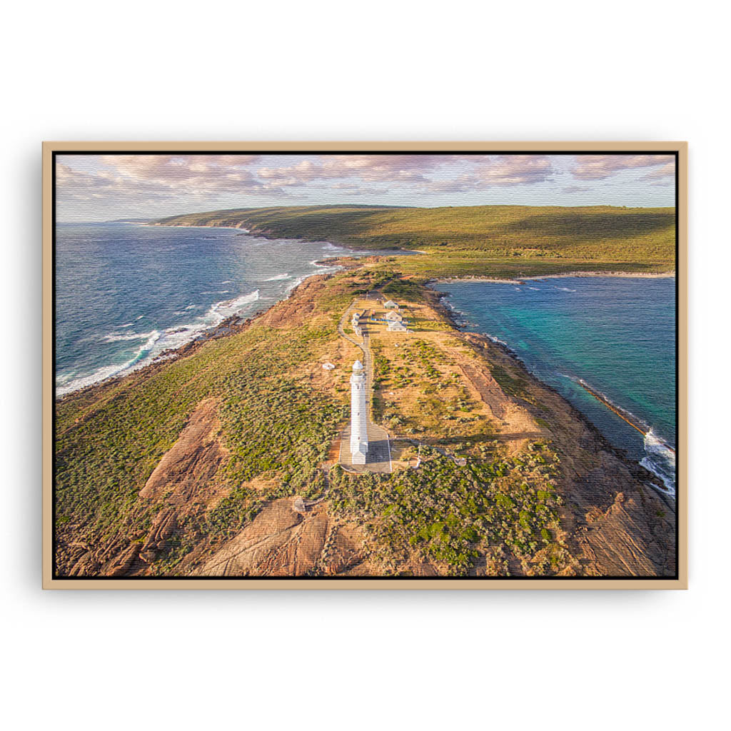 Aerial view of Cape Leeuwin Lighthouse at sunset framed canvas in raw oak