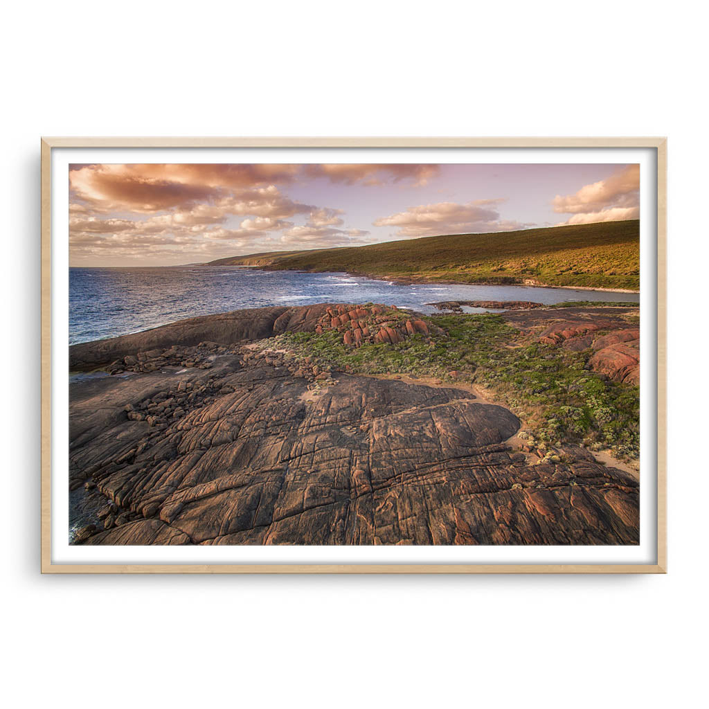 Sunset at Cape Leeuwin in Western Australia framed in raw oak