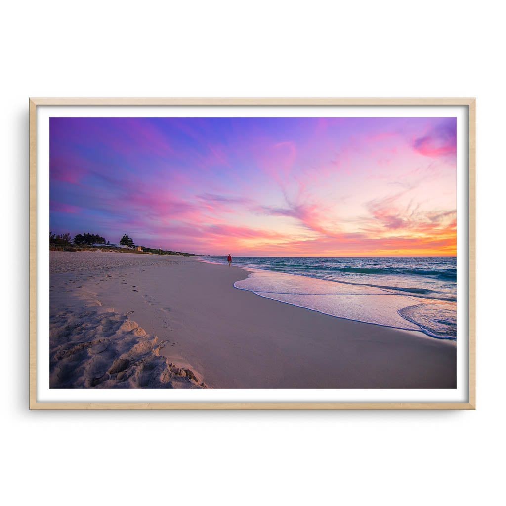 Beautiful sunset on Mullaloo Beach in Perth, Western Australia framed in raw oak