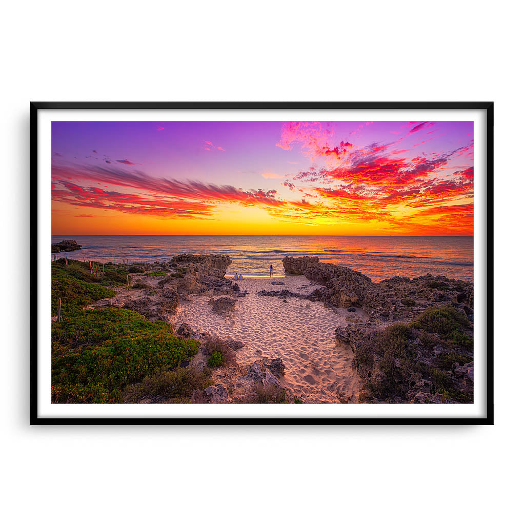 Watching the sunset at Mettams Beach in Western Australia framed in black