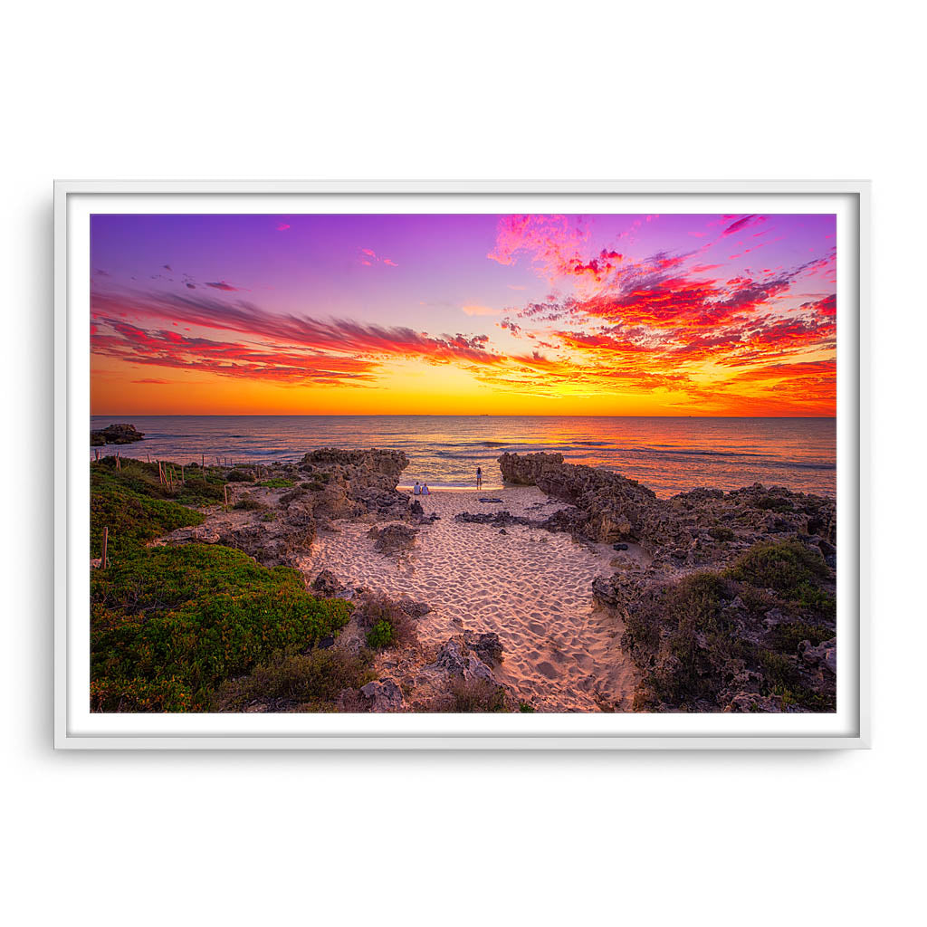Watching the sunset at Mettams Beach in Western Australia framed in white