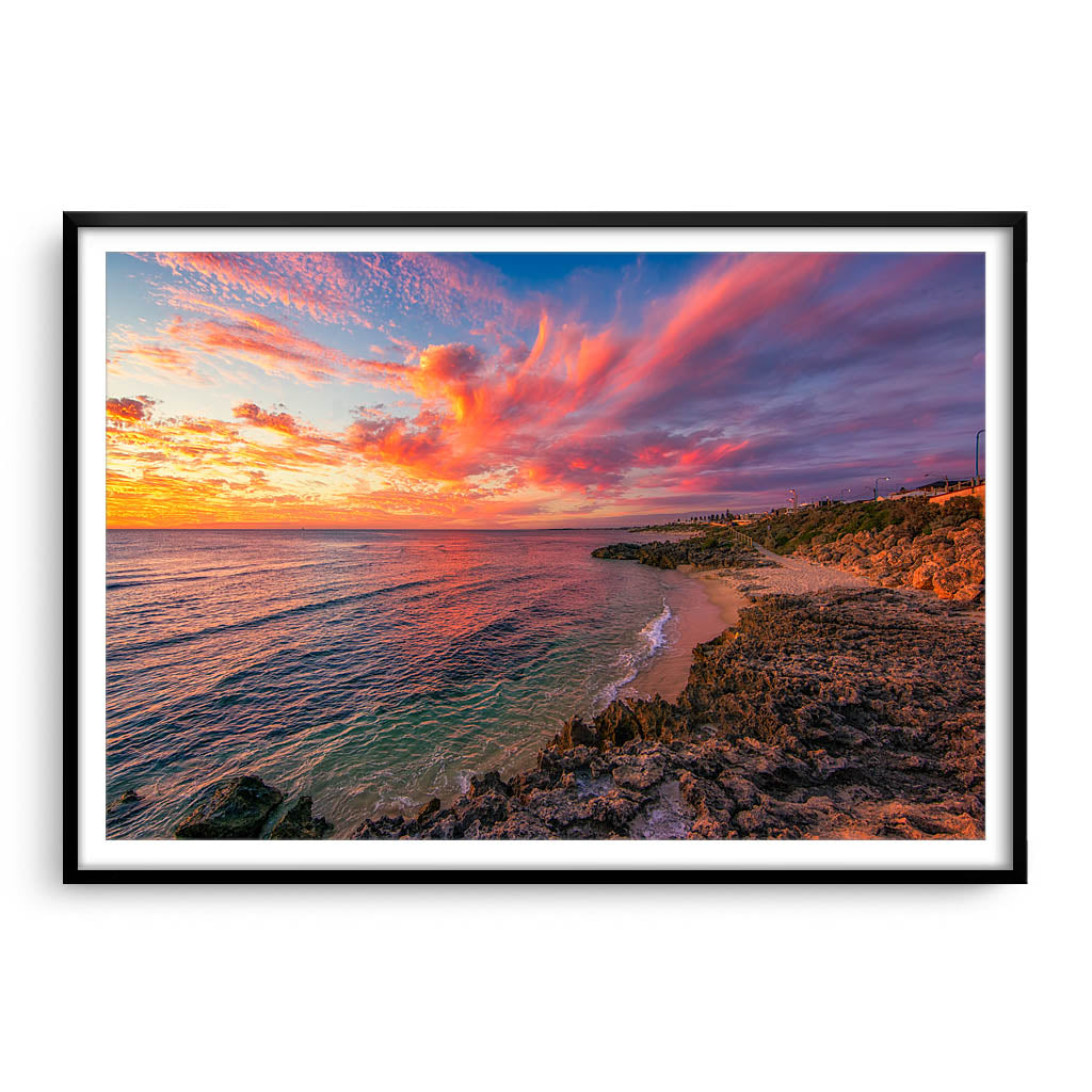 Candy Floss clouds at Mettams Pool in Perth, Western Australia framed in black