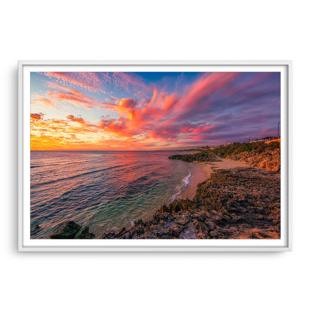 Candy Floss clouds at Mettams Pool in Perth, Western Australia framed in white