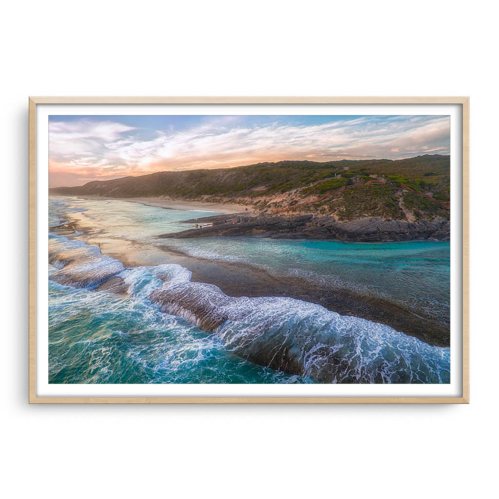 Dramatic aerial view of 11 Mile Beach in Esperance, Western Australia framed in raw oak