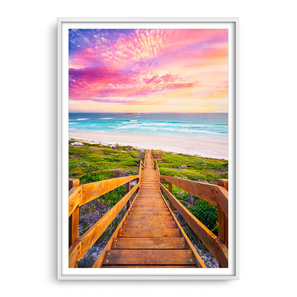 Wooden steps leading down to the beach at sunset in Esperance, Western Australia framed in white