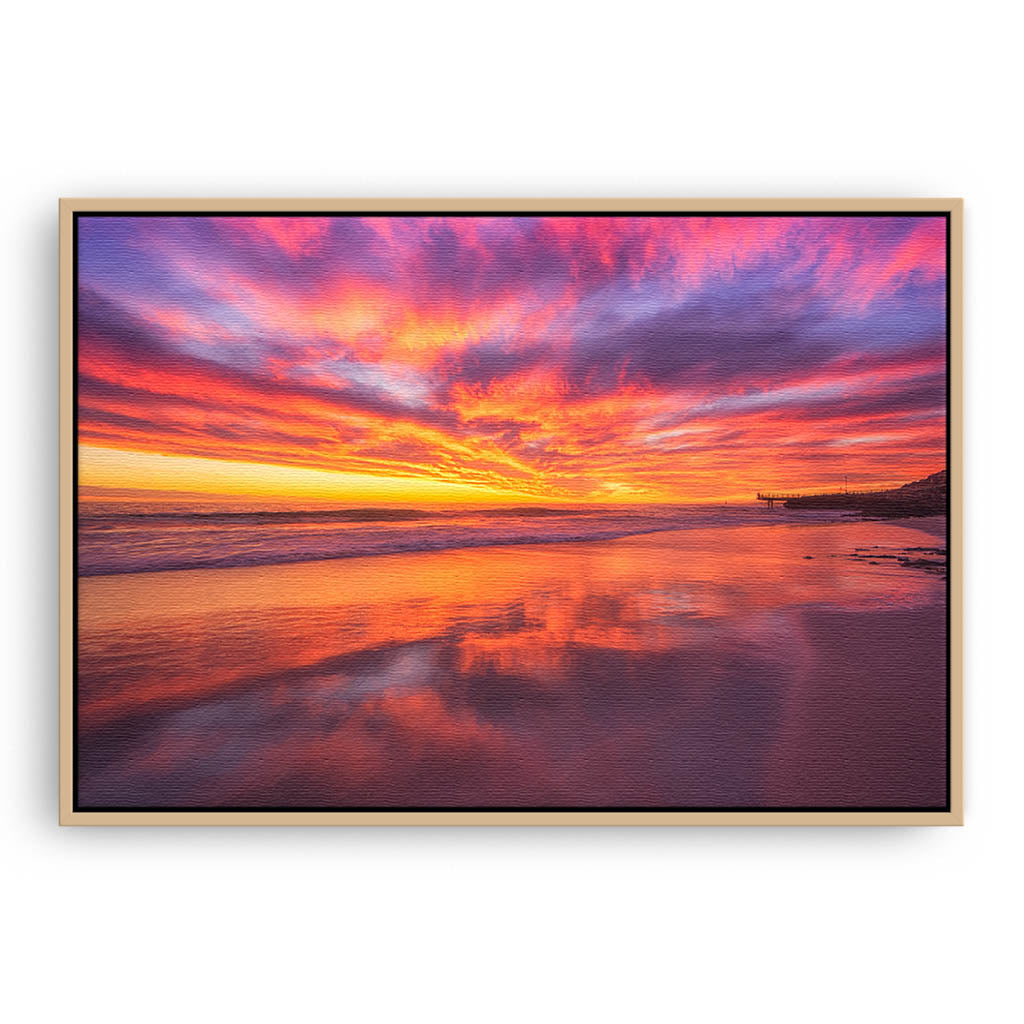 Rich, colourful sunset at North Beach in Western Australia framed canvas in raw oak