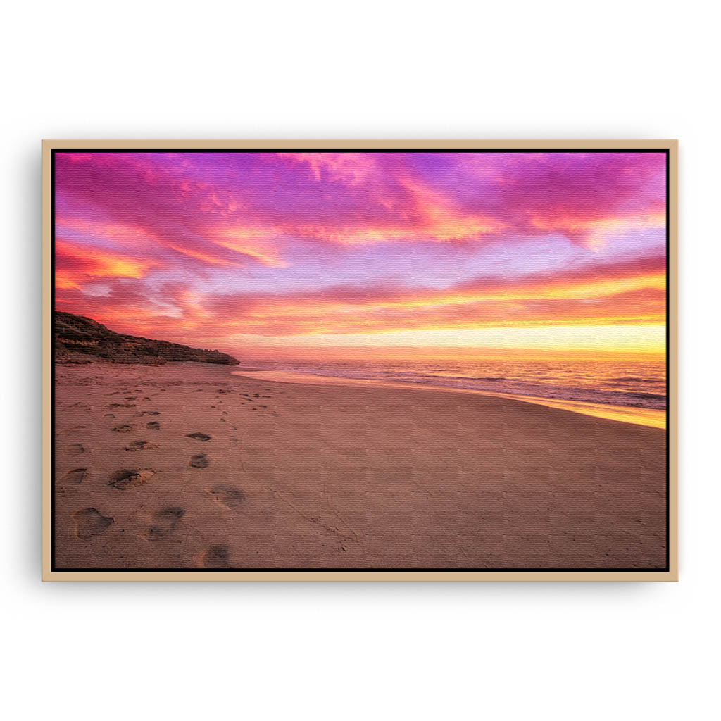 Sunset footprints at North Beach, Perth, Western Australia framed canvas in raw oak