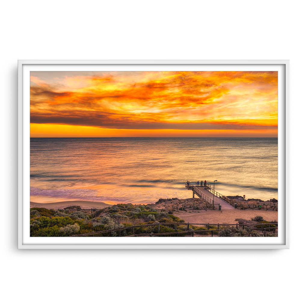 Smoke filled sunset over North Beach Jetty in Perth, Western Australia framed in white