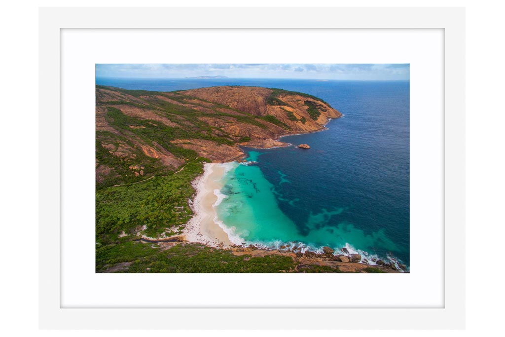 Aerial view of Little Hellfire Bay in Western Australia framed in white