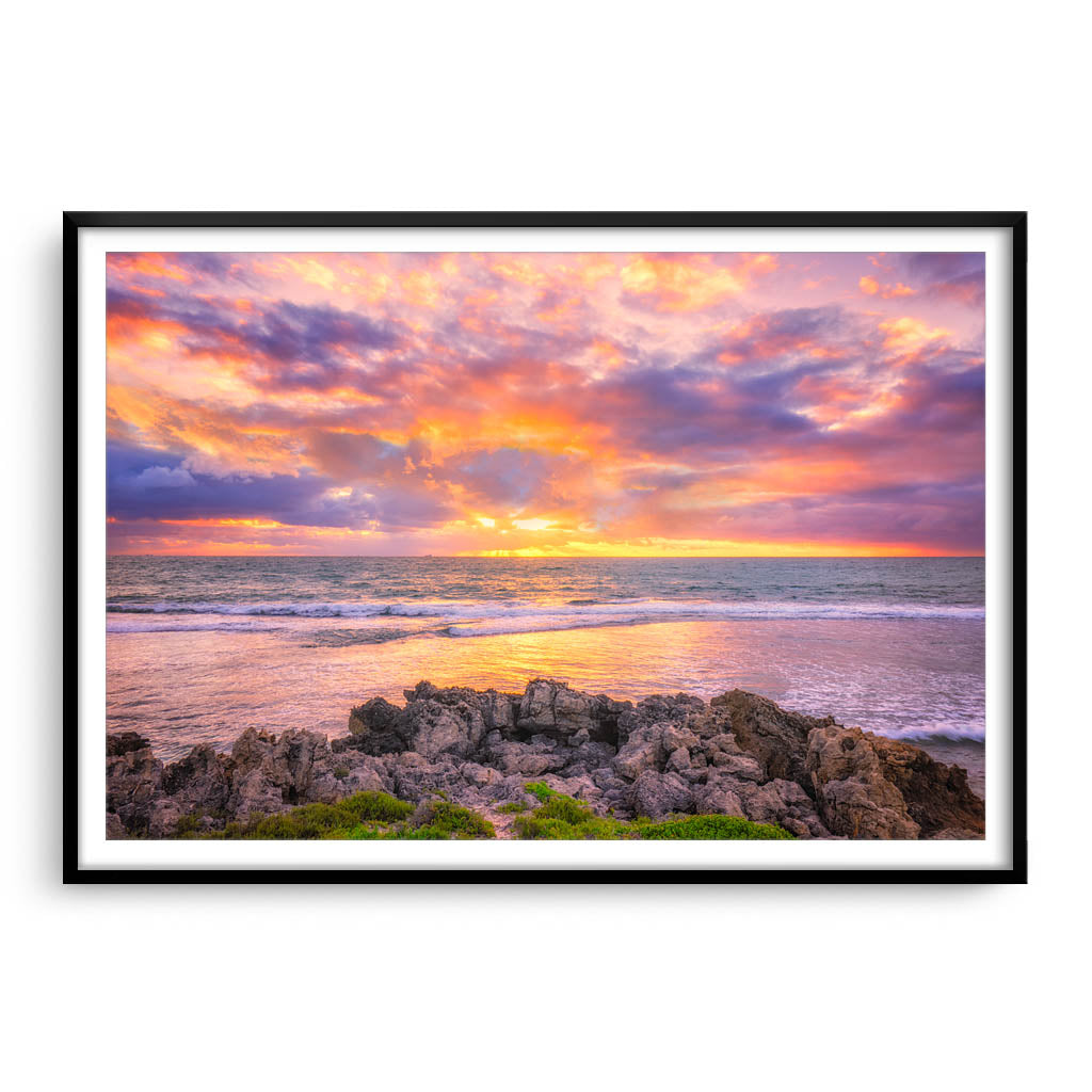 Colourful sunset at Mettams Pool in Perth, Western Australia framed in black