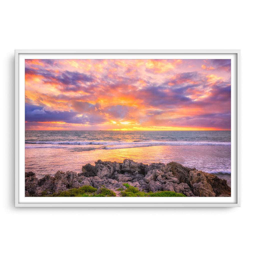 Colourful sunset at Mettams Pool in Perth, Western Australia framed in white