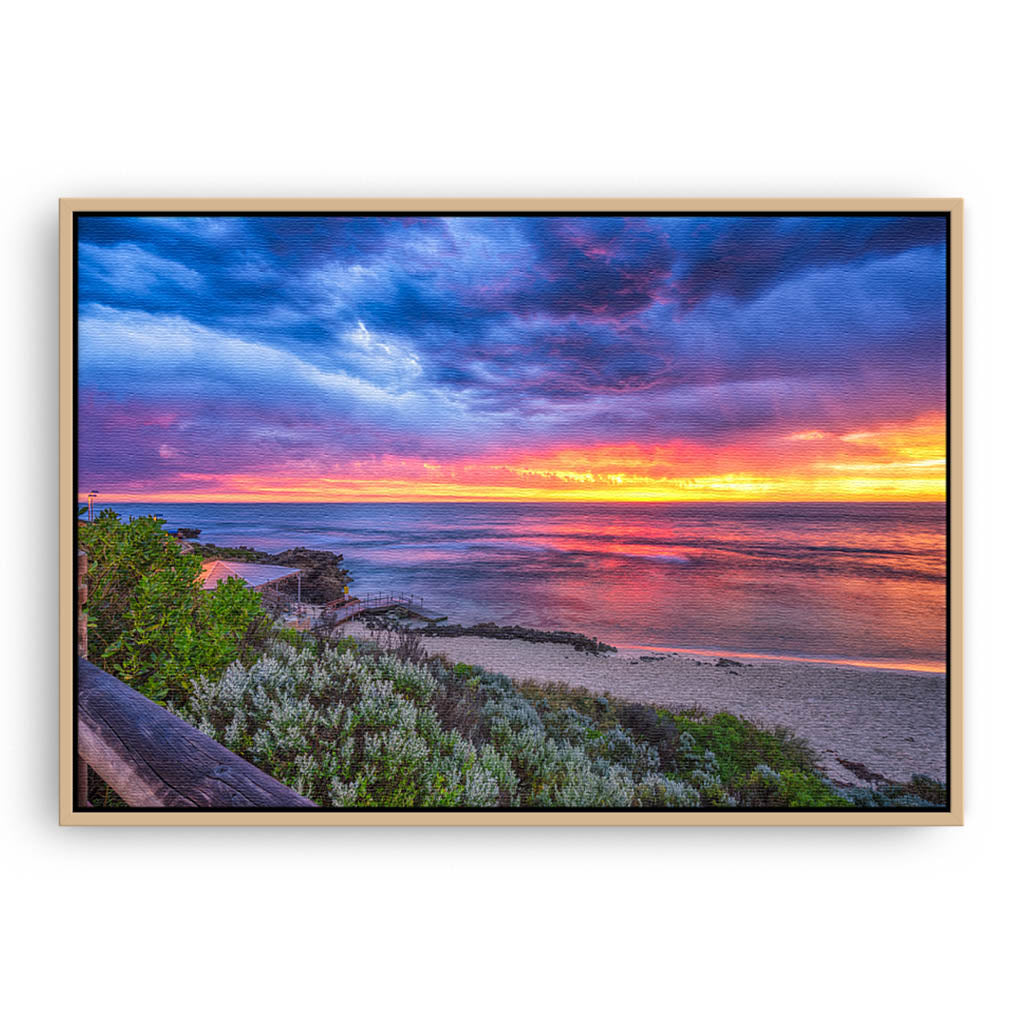 Colourful sunset over Mettams Pool in Perth, Western Australia framed canvas in raw oak