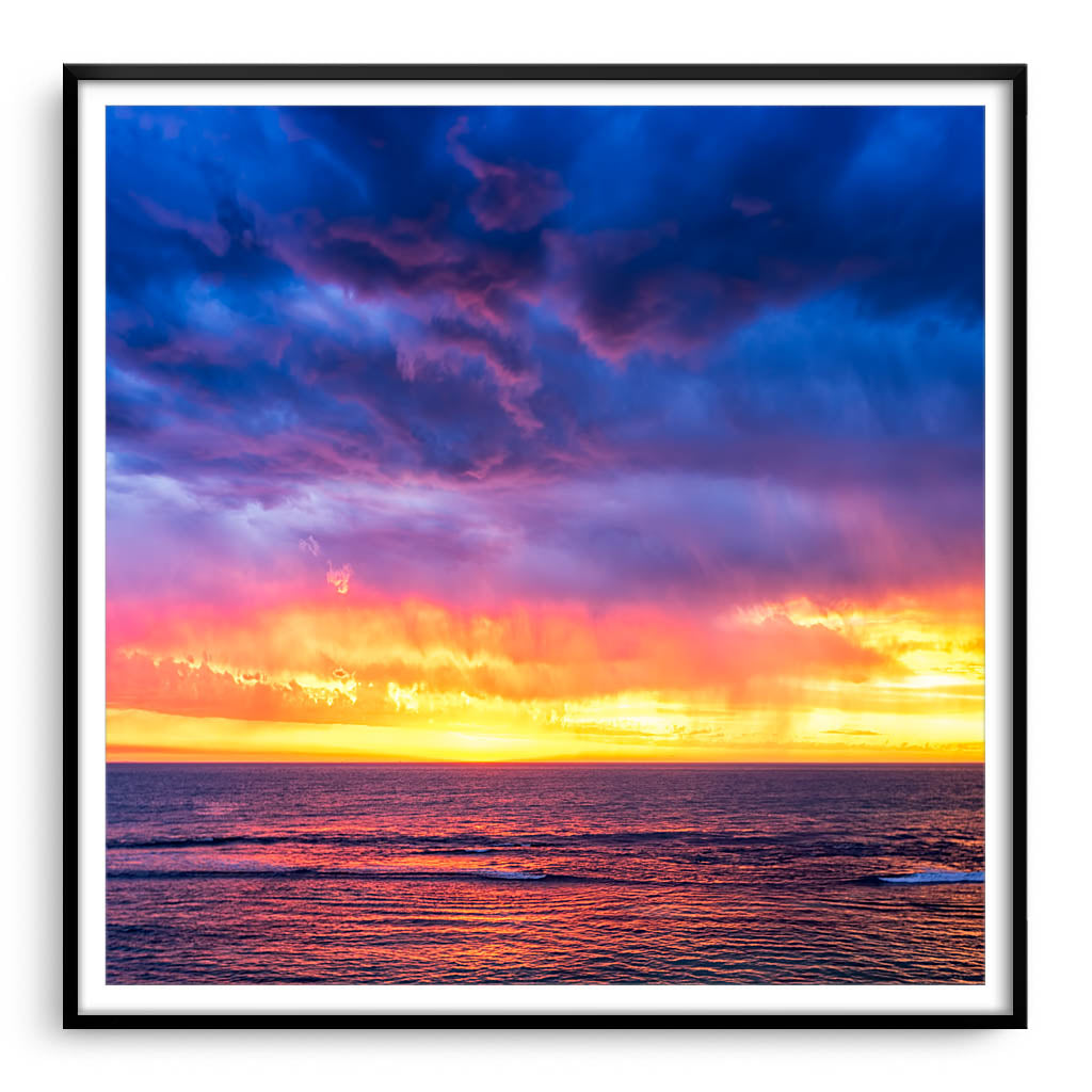 Colourful skies after a thunder storm in Perth, Western Australia framed in black