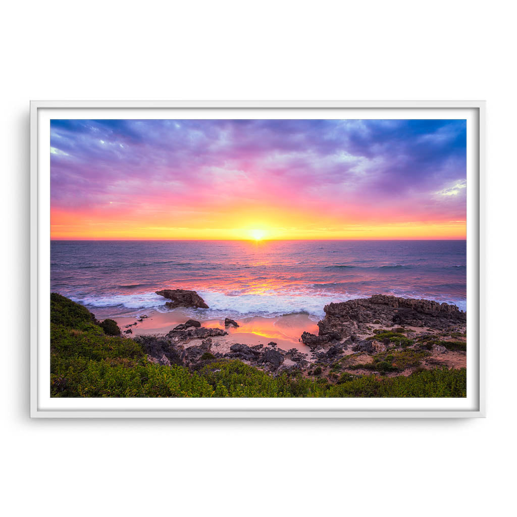 Beautiful sunset at Trigg Beach in Perth, Western Australia framed in white