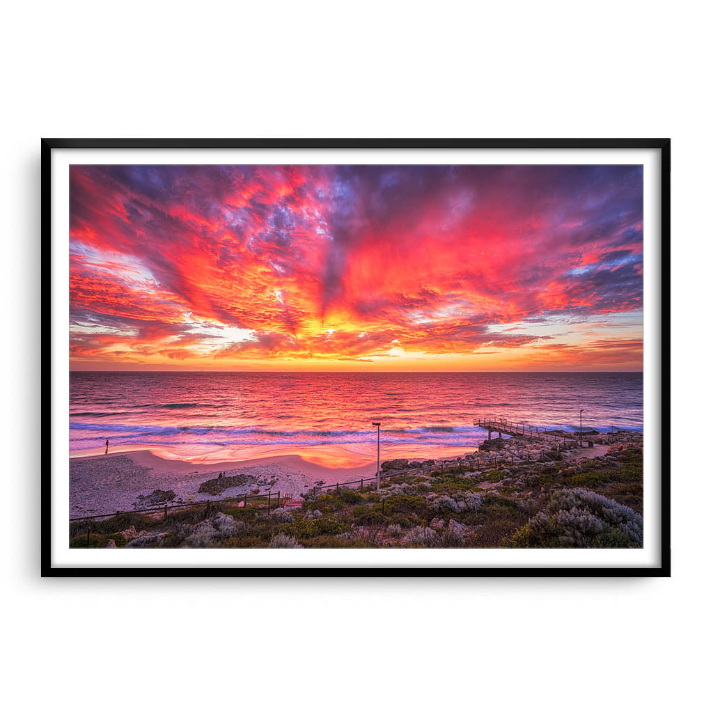 Incredible red sunset over North Beach Jetty in Perth, Western Australia framed in black