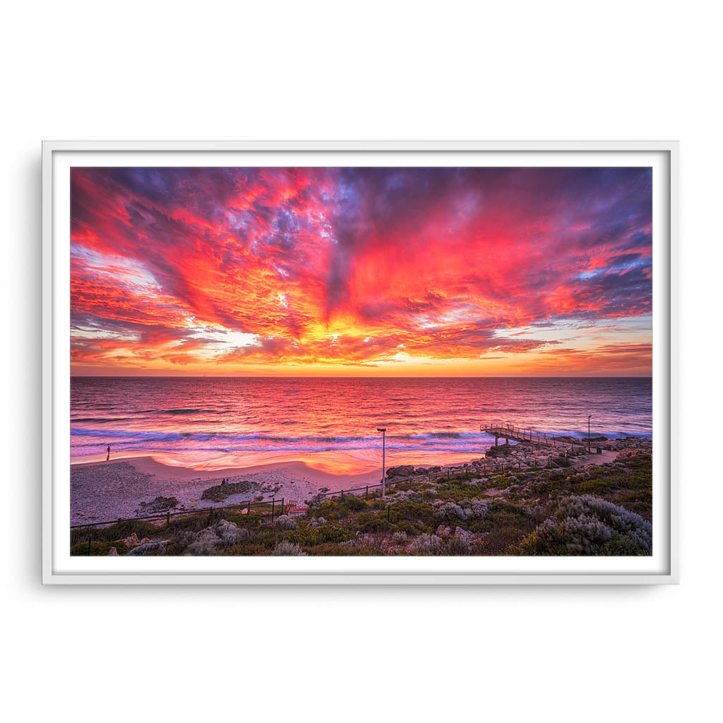 Incredible red sunset over North Beach Jetty in Perth, Western Australia framed in white