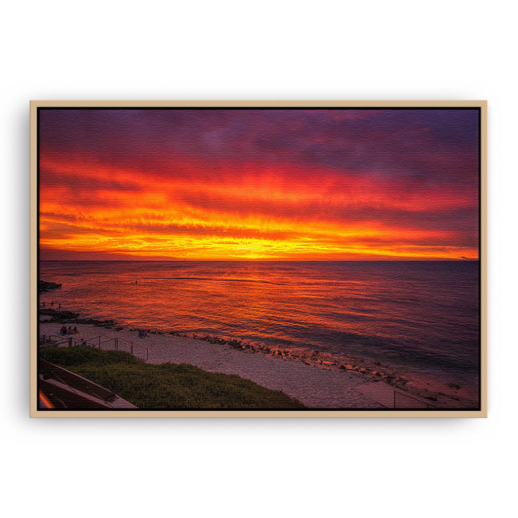 Fiery skies over Mettams Pool in Perth, Western Australia framed canvas in raw oak