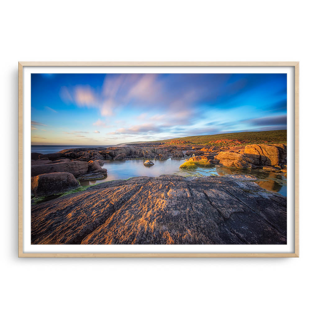 Cape Leeuwin rock pools in Augusta, Western Australia framed in raw oak