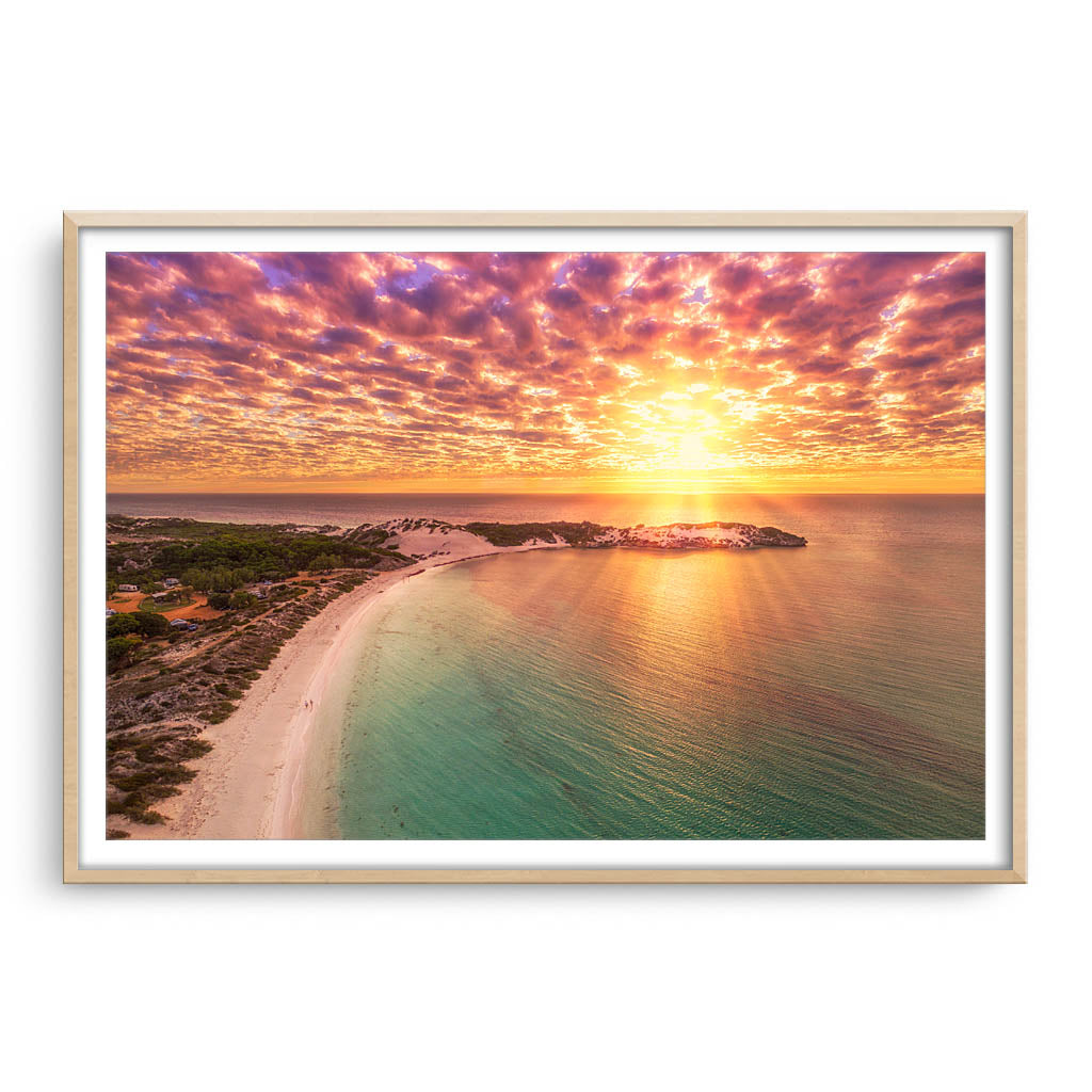 Aerial sunset over Sandy Bay in Western Australia framed in raw oak