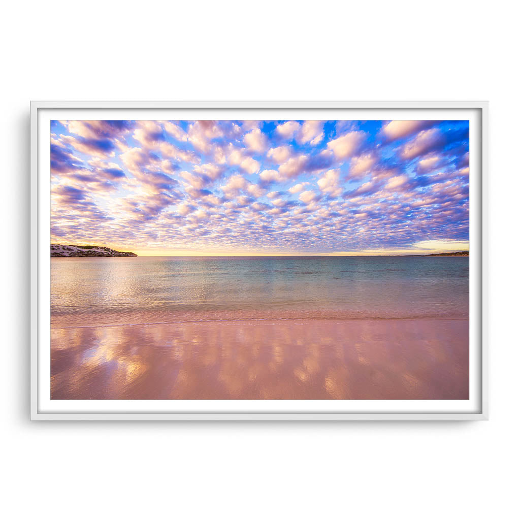 Cotton candy clouds over Sandy Cape in Western Australia framed in white