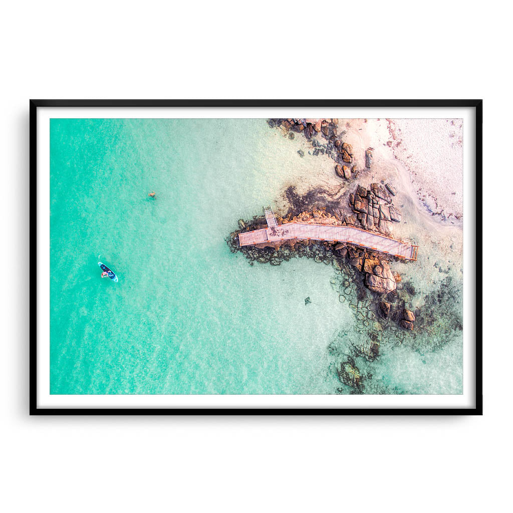 Aerial view of SUP in Augusta, Western Australia framed in black