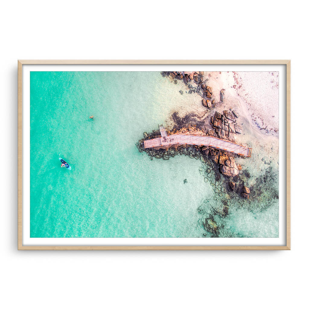 Aerial view of SUP in Augusta, Western Australia framed in raw oak