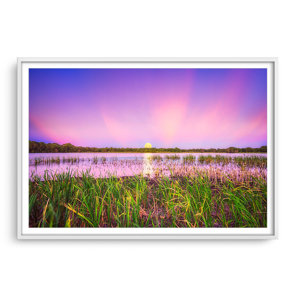 Moon rising over Lake Gwelup in Perth, Western Australia framed in white