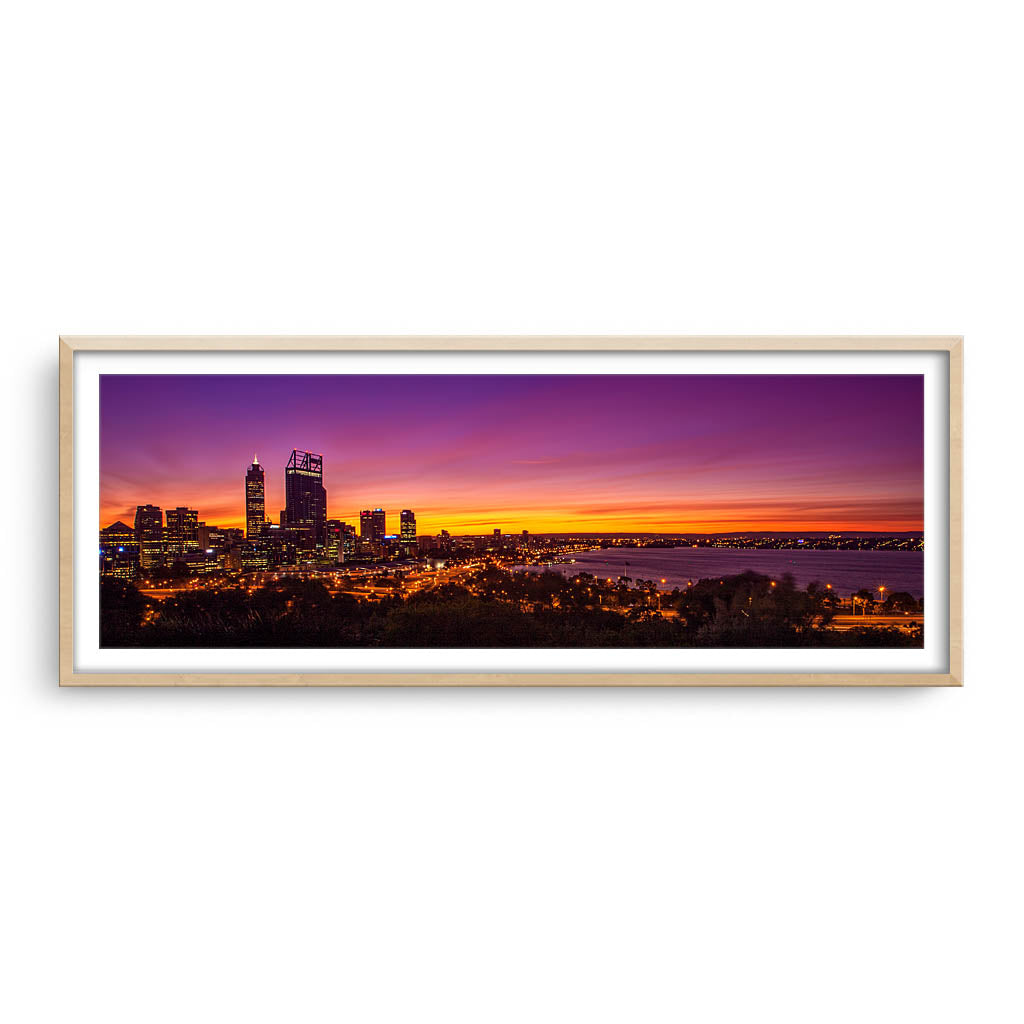 Perth City at sunrise framed in raw oak