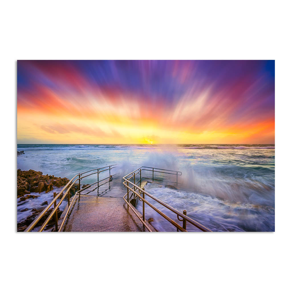 Colourful stormy sunset at Mettams Pool in Perth, Western Australia