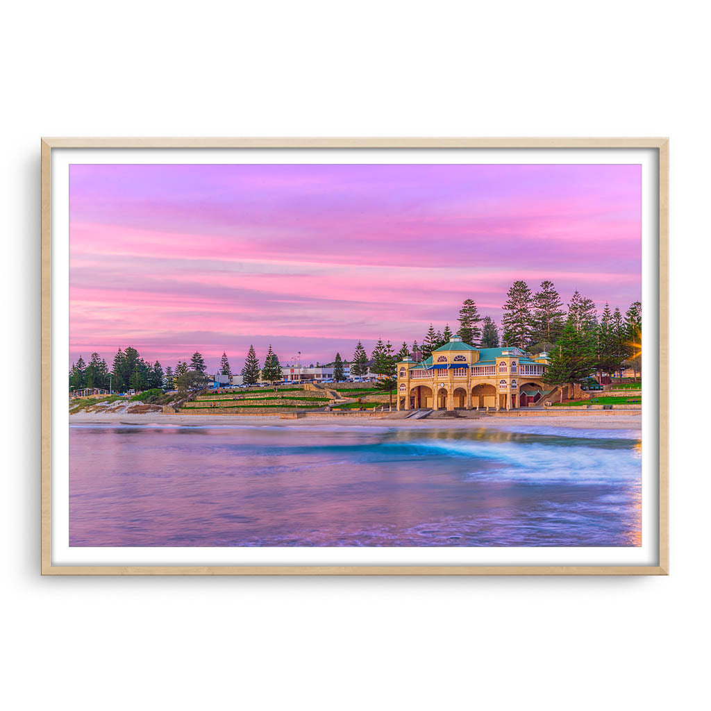 Sunset over Cottesloe Beach in Perth, Western Australia framed in raw oak