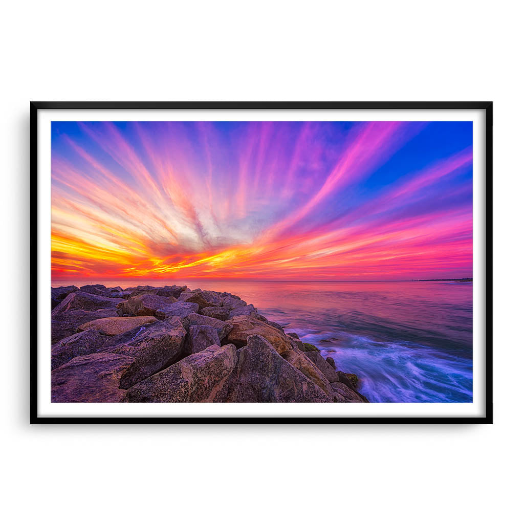 Stunning sunset over Cottesloe Beach in Perth, Western Australia framed in black