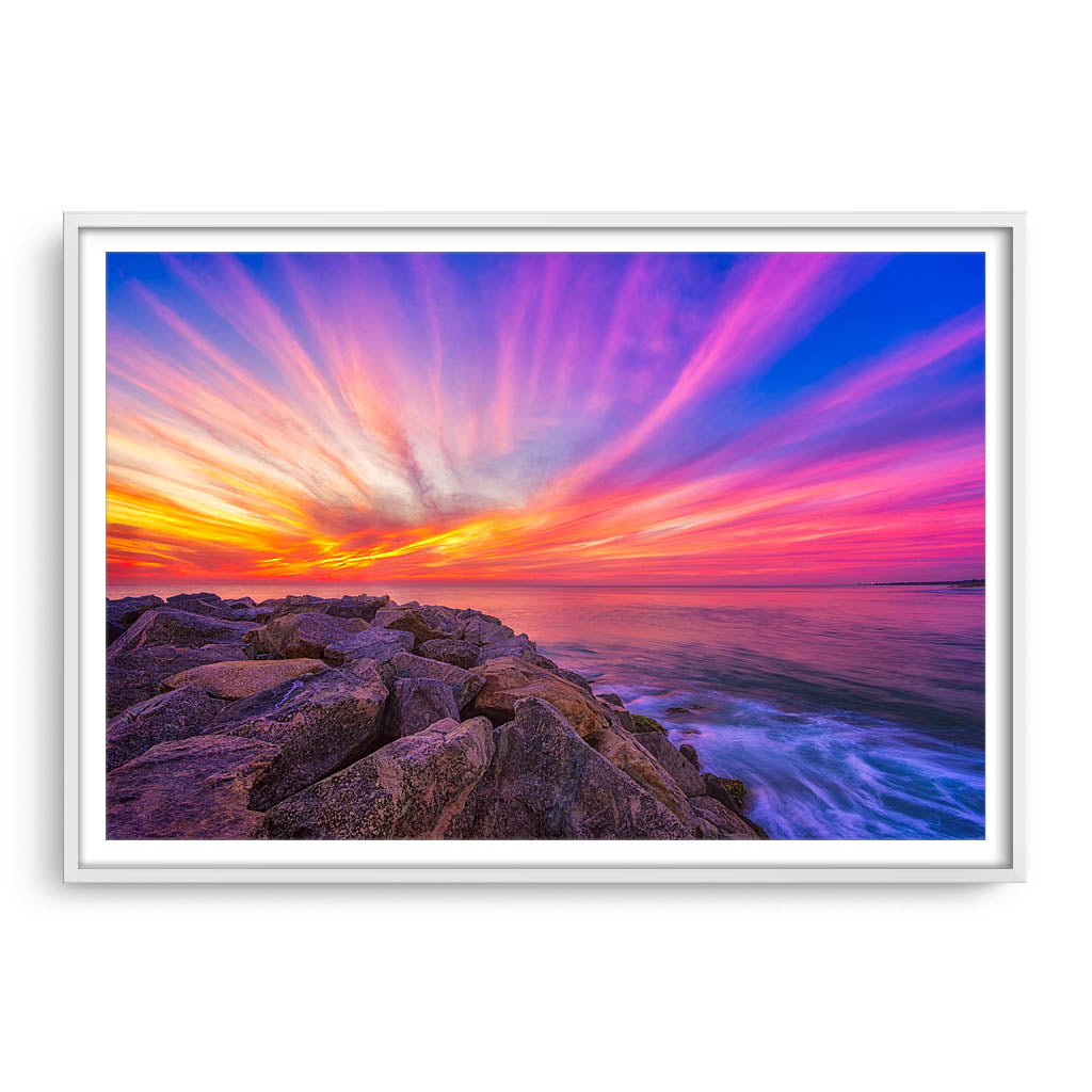 Stunning sunset over Cottesloe Beach in Perth, Western Australia framed in white