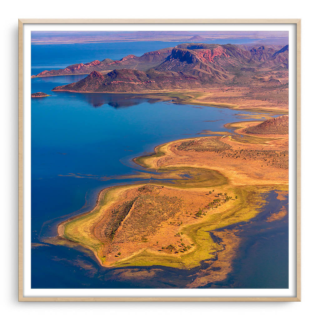 Aerial view of Lake Argyle in the Kimberley, Western Australia framed in raw oak