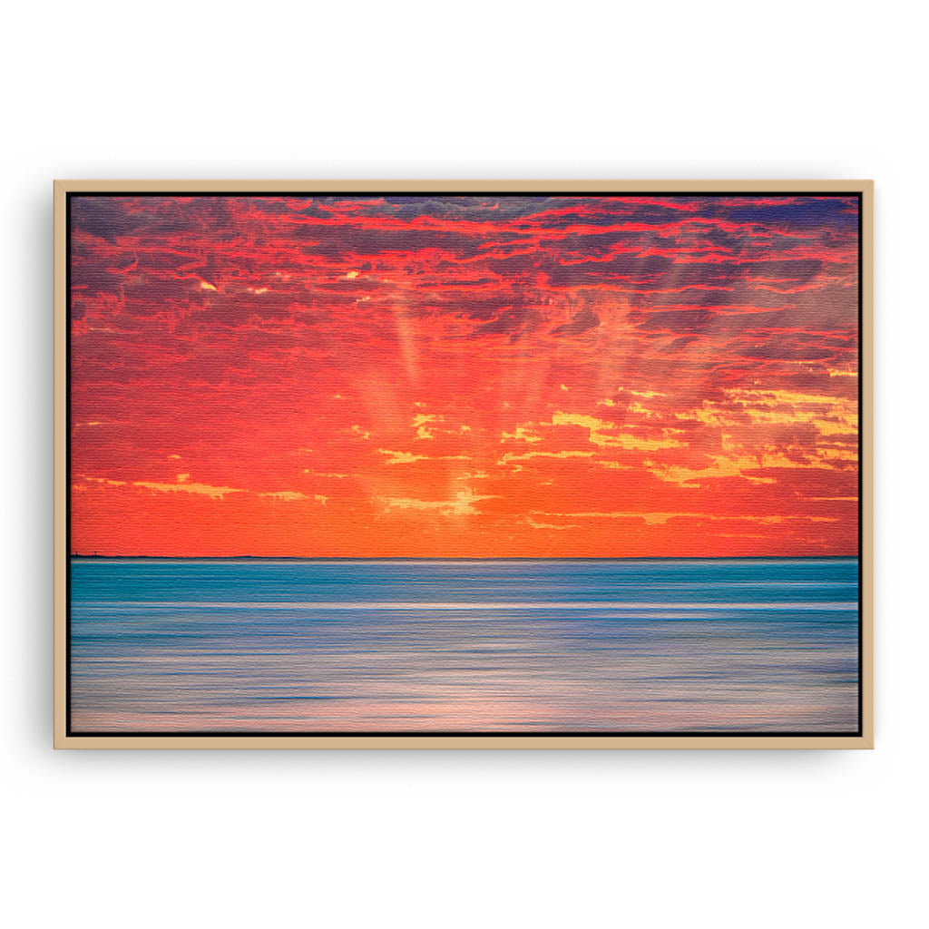 Sun rays over Scarborough Beach in Perth, Western Australia framed canvas in raw oak