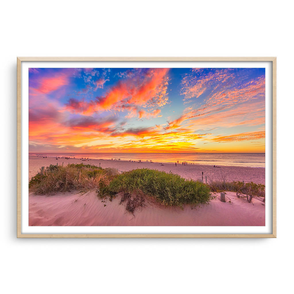 Summer sunsets over Scarborough Beach in Perth, Western Australia framed in raw oak