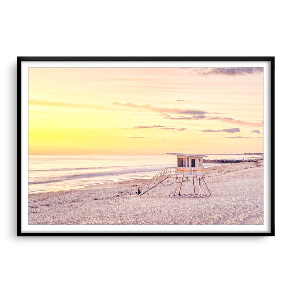A calming sunset at City Beach in Perth, Western Australia framed in black