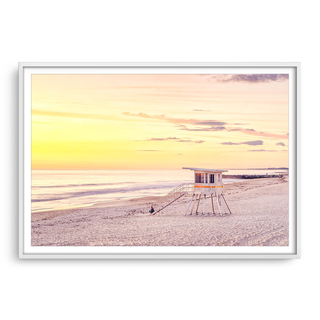 A calming sunset at City Beach in Perth, Western Australia framed in white