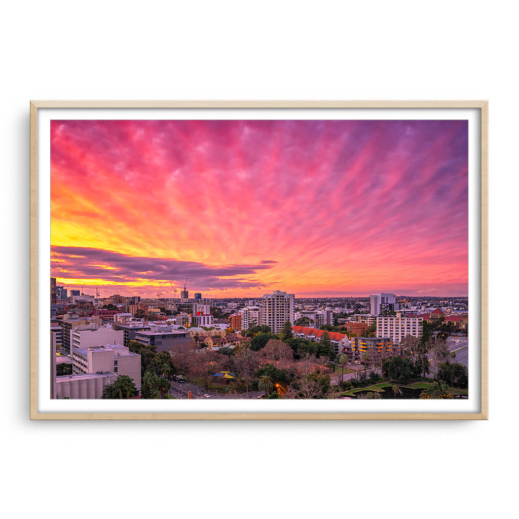 Sunset over East Perth in Western Australia framed in raw oak