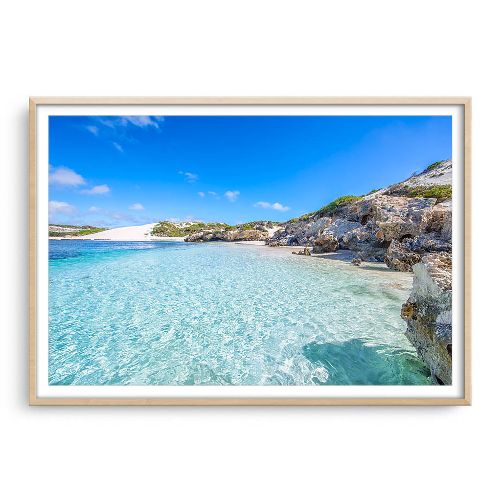 Beautiful blue waters at Sandy Cape on the Coral Coast of Western Australia framed in raw oak