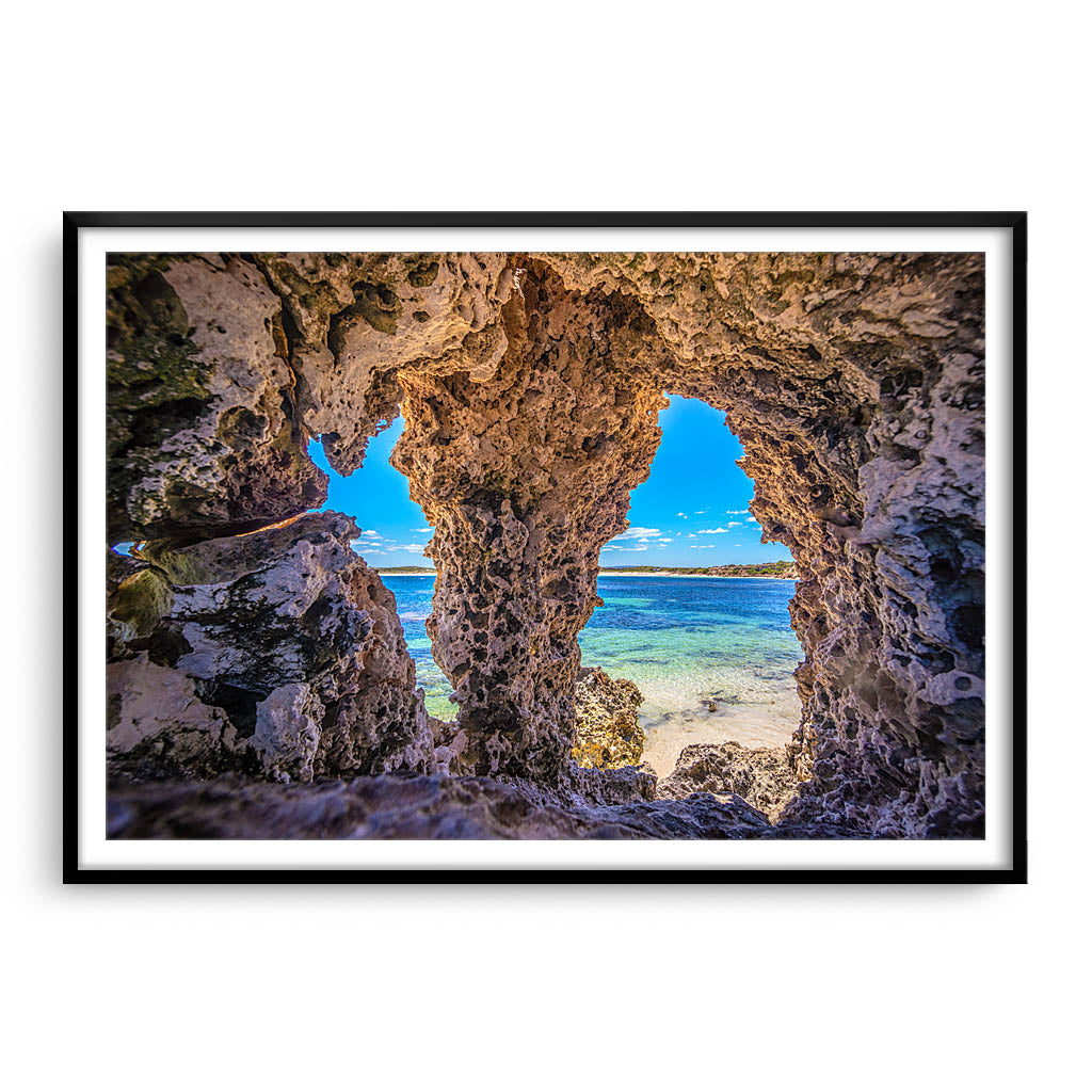 Natures windows at Sandy Cape in Western Australia framed in black